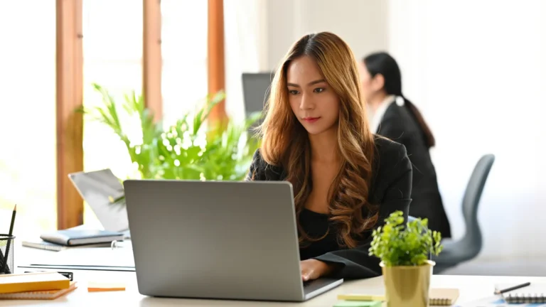 Girl behind a laptop